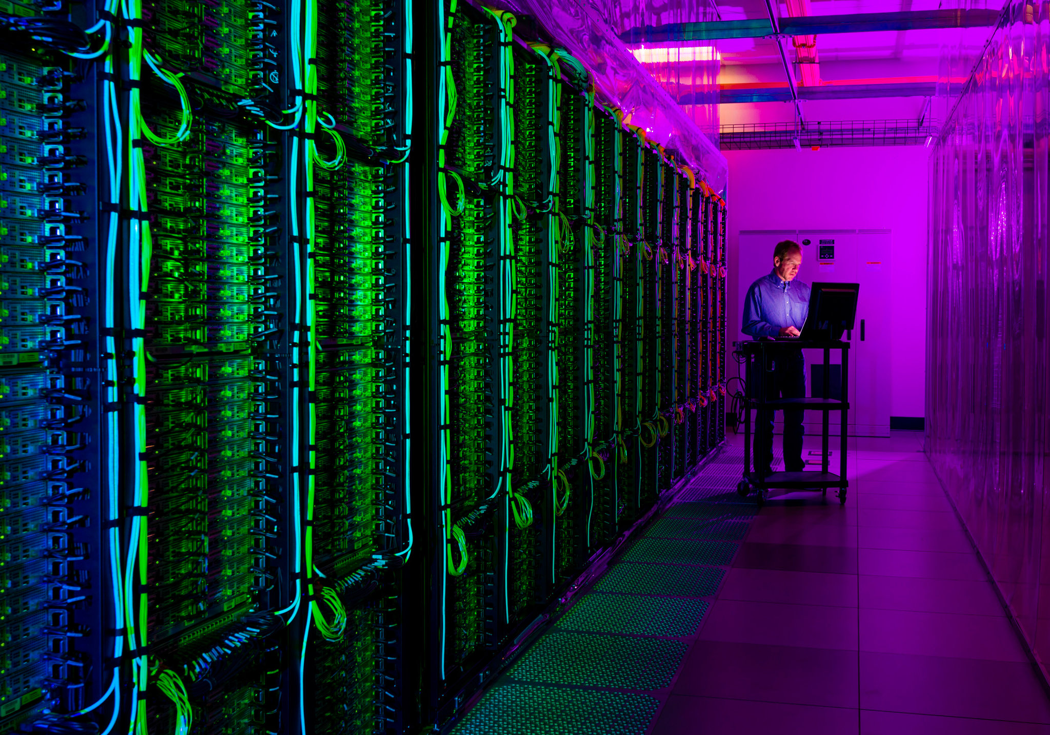 Technician securely managing data infrastructure access in a server room