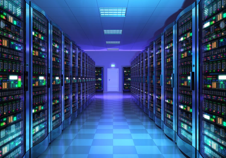 Rows of data infrastructure server racks in a modern facility